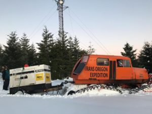 Snowcat that hauled diesel generator up to cell tower