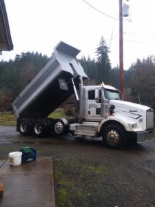 truck dumping rock